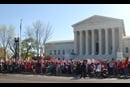 immigration1 Demonstrators stand outside the U.S. Supreme Court on April 18 as the court hears oral arguments regarding the legality of two Obama Administration policies that would defer deportation for about 5 million immigrants. Photo by Walker Weatherly, Board of Church and Society