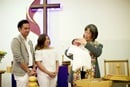 baptism-rev-choy-st-paul-umc The Rev. Anne Lau Choy baptizes an infant at St. Paul United Methodist Church in Fremont, Calif. Photo by Brian Teodoro.