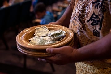 A Sunday collection is taken up at the Tongan United Methodist Church in West Valley City, Utah. Twenty-six U.S. conferences in 2018 paid full apportionments, including the Tongan congregation’s home conference. Photo by Kathleen Barry, UMNS.