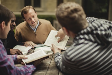 A small group of men study the Bible. Photo by Shaun Menary, Lightstock.com.