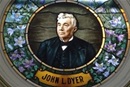 Father John Lewis Dyer's portrait in stained glass hangs in the Colorado State Capitol. Video image by United Methodist Communications.