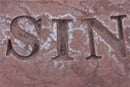 the word "sin" carved in stone, photo by Cliff Johnson, Flickr Creative Commons