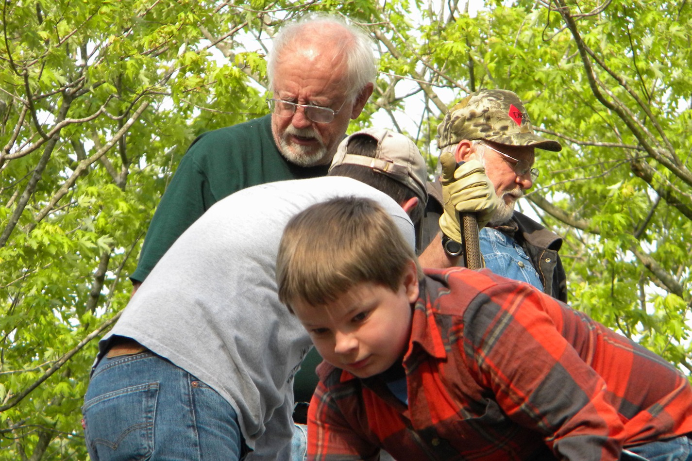 Children and older adults working together during a mission trip. Photo courtesy of Mary Lee Russell. 