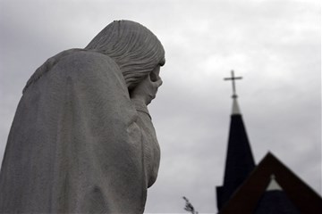 A statue of "Weeping Jesus" is found near the memorial site in Oklahoma City where 168 perished in the 1995 terrorist bombing. Photo by Ronny Perry, UMNS