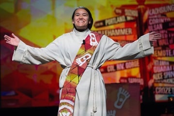 The Rev. Megan Shitama Weston leads worship during the 2016 United Methodist General Conference. File photo by Mike DuBose, United Methodist Communications. The Rev. Megan Shitama Weston leads worship during the 2016 United Methodist General Conference. File photo by Mike DuBose, United Methodist Communications.