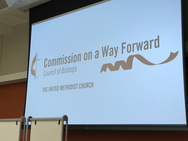 Photo of the group's logo shown on a screen during an earlier meeting. Photo by Diane Degnan, United Methodist Communications.