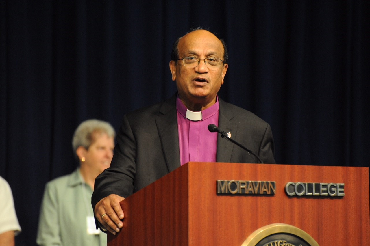 Bishop Sudarshana Devadhar of the New England Conference speaks following the passage of the resolution. Photo credit: Mike Reiss, The Moravian Church