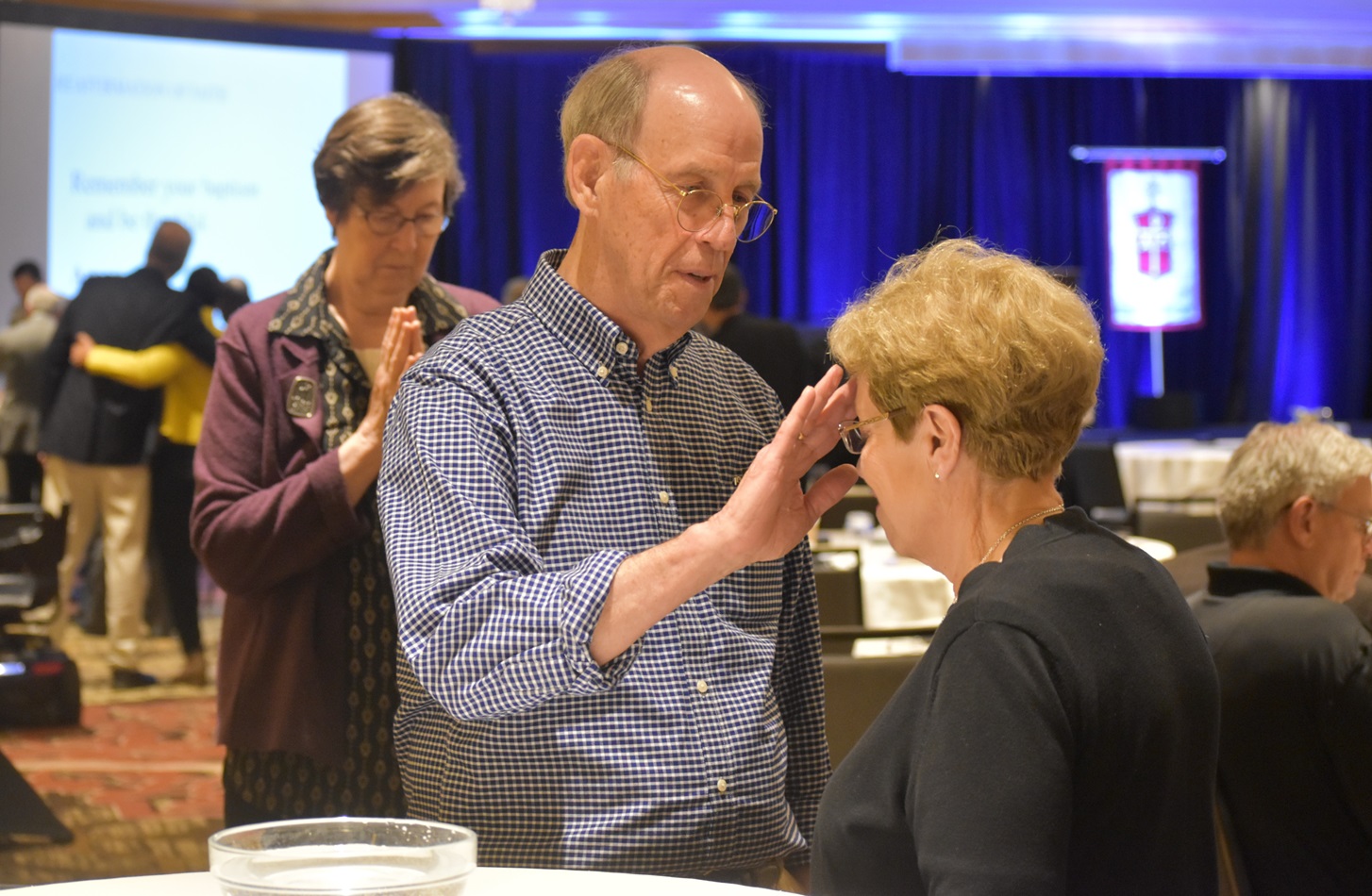 Bishops renew their baptism vows at the close of the May 2019 Council of Bishops meeting outside Chicago, May 9, 2019. Photo courtesy of the Council of Bishops of The United Methodist Church.