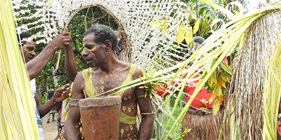 The WCC delegation is received ceremoniously in the village of Kaliki with traditional customs.