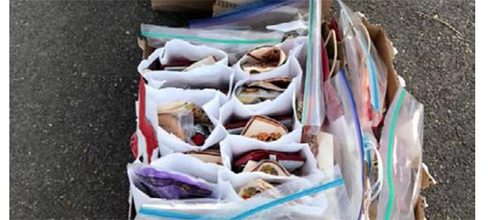 School children grab a asnack before heading to school. Andrea Gentry, a member of Wynne First UMC started a school bus stop snack program for local kids in the Wynne School District. 