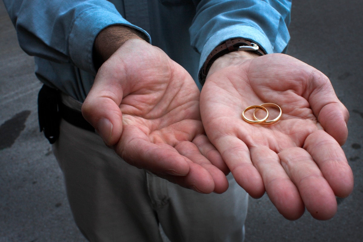 What can a divorced person expect at The United Methodist Church? Photo illustration of hands, by Kathleen Barry, United Methodist Communications.