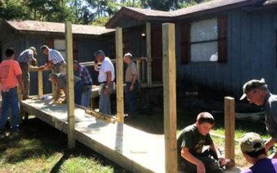 Volunteers from Imagine Ministry help build wheelchair ramp for Agnes Futch. Courtesy photo.