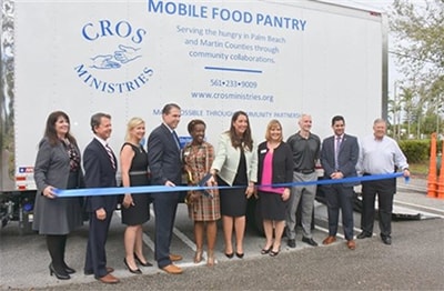 Members of CROS ministries pose for a groundbreaking photograph. 