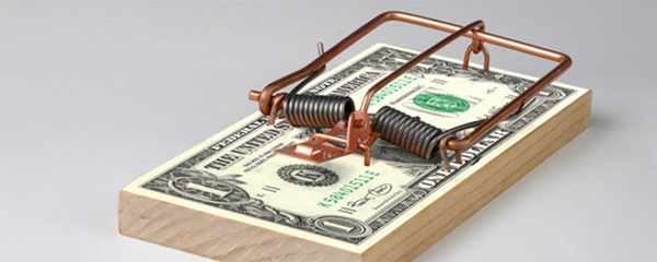 Courtesy/Stock photo. Image of dollar bills in a mousetrap. Courtesy/Stock photo. Image of dollar bills in a mousetrap.