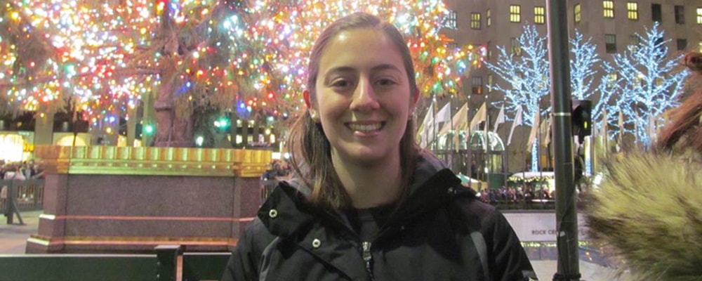 GOH recipient poses in front of park during Christmas. Courtesy photo.