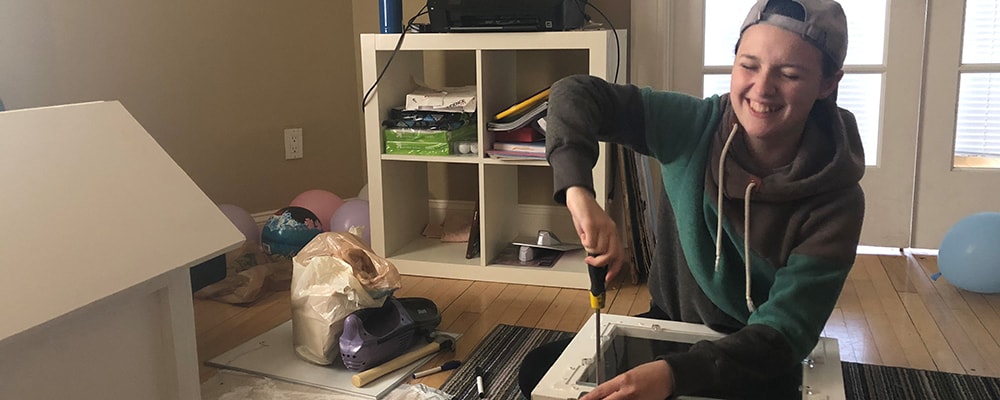 Daniel De Corte works on arts and crafts. Courtesy photo