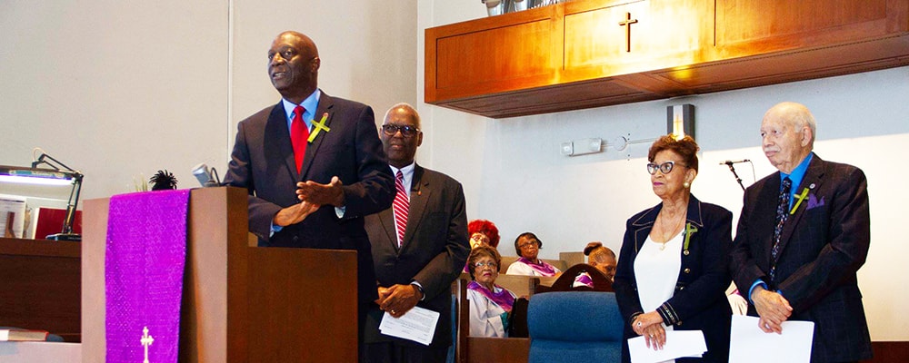 Dr. Jim Salley at pulpit, Bishop Warner Brown (behind Dr. Salley) and and Mr. and Mrs.Hardy. Courtesy photo.