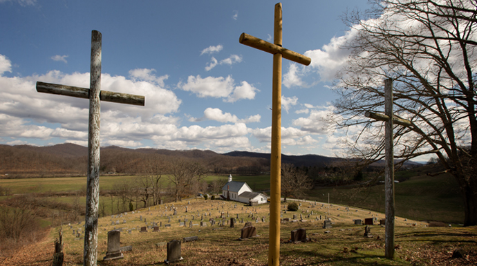 Three crosses stand above the cemetery at Israel United Methodist Church near Montrose, W.Va. Photo by Mike DuBose, UMNS