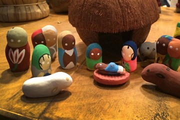 A Nativity set featuring a coconut stable or shelter and figures hand-made from clay, purchased during JoAnn Hall's first mission trip to Haiti. Photo by JoAnn Hall.