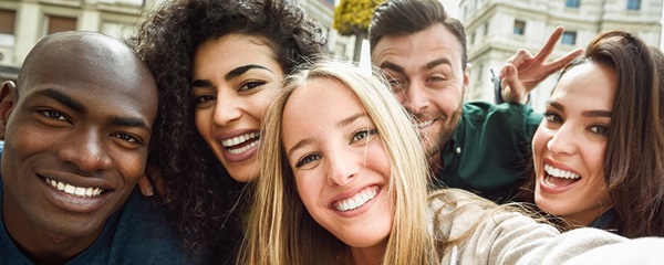 Group of young people taking a selfie. Group of young people taking a selfie.
