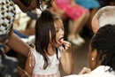 A child takes communion at First Grace United Methodist Church in New Orleans, Louisiana. Photo by Kathy L. Gilbert, UM News.