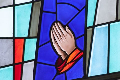 Stained glass window of hands praying. Photo by Jan Snider, United Methodist Communications.  Stained glass window of hands praying. Photo by Jan Snider, United Methodist Communications.