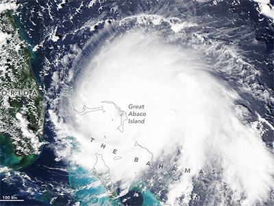 A NASA satellite image captures Hurricane Dorian over the Bahamas on Sept. 1, as the powerful Category 5 storm was directly over Great Abaco Island. Dorian became the strongest hurricane on record in the northwestern Bahamas. NASA Earth Observatory image by Lauren Dauphin, using MODIS data from NASA EOSDIS/LANCE and GIBS/Worldview.
