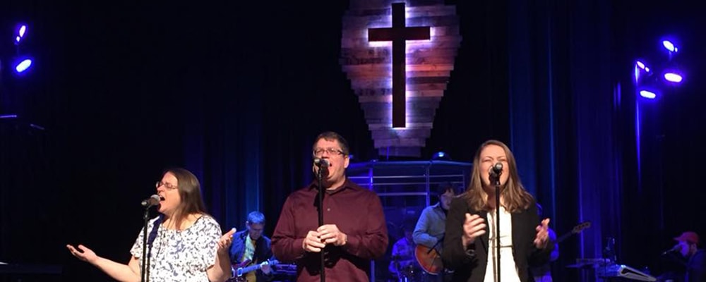 Delaney Tacka (far right) singing at concert. Courtesy photo.