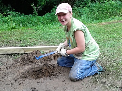 Tacka working in a garden. Courtesy photo.
