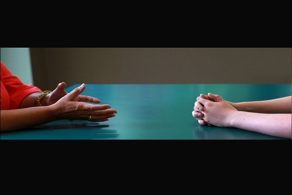 Hands in dialogue: sharing and listening. Photo illustration by Kathleen Barry, United Methodist Communications