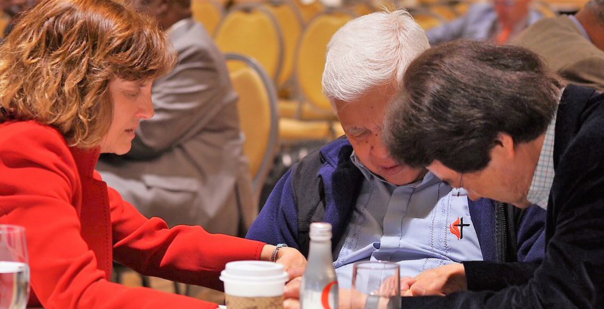 Pausing to listen in prayer allows time for God to speak to our hearts. Photo courtesy Council of Bishops.