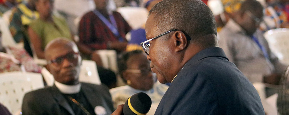 Bishop Samuel J. Quire Jr. leads discussion at a meeting of the Liberia Annual Conference in Ganta. The conference approved a resolution calling for changes to the Protocol of Reconciliation & Grace through Separation, one of the plans headed to the 2020 United Methodist General Conference. 