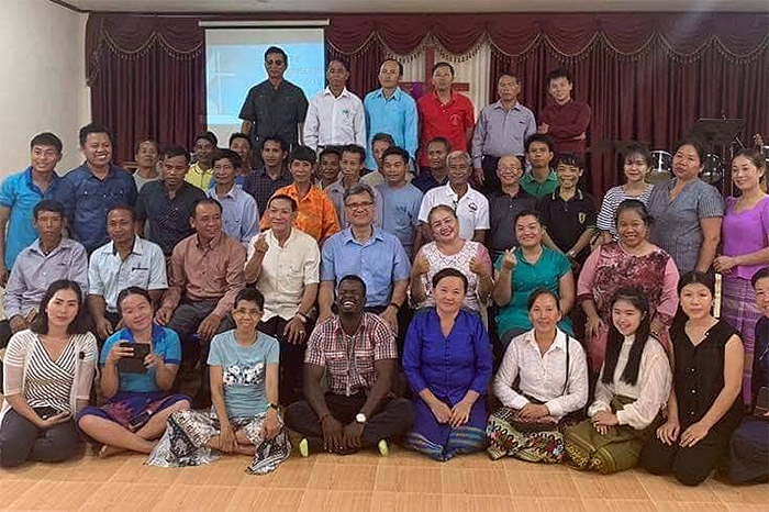 Pastors and other leaders take time for a group photo during a mission summit held in August 2019. General Secretary Thomas Kemper joined the group for the event; he is pictured in the center.