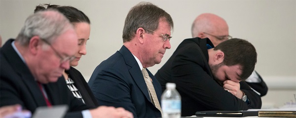 People who had submitted briefs to the United Methodist Judicial Council pray prior to a May 2018 oral hearing in Evanston, Ill. From left are the Rev. Keith Boyette, Stephanie Henry, Bishop Scott Jones, John Lomperis and Thomas E. Starnes. Boyette, Jones and Lomperis were among 28 United Methodists who signed a statement from a meeting in Atlanta about the formation of a new traditionalist denomination. File photo by Kathleen Barry, UM News.