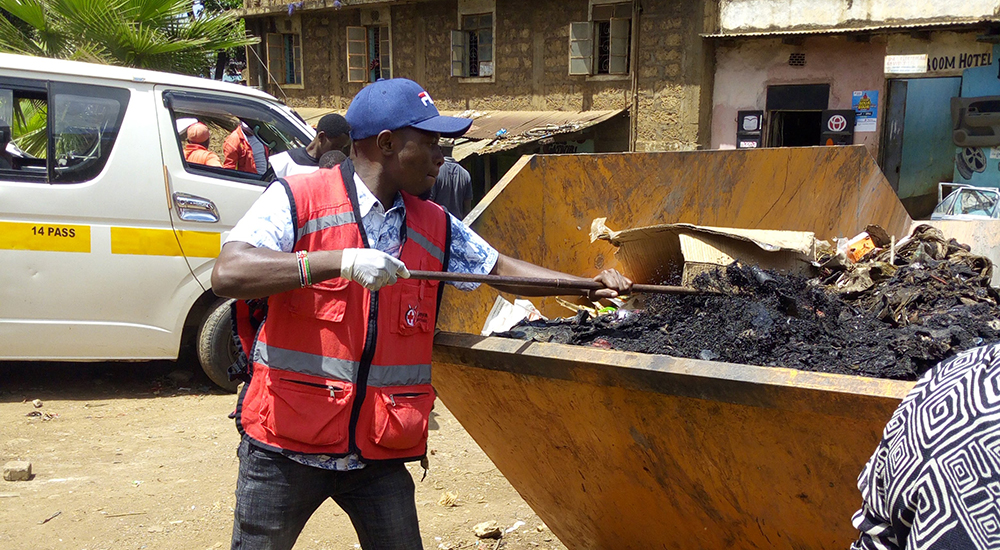 WCS Scholar seen here scooping coal from container. Courtesy photo.