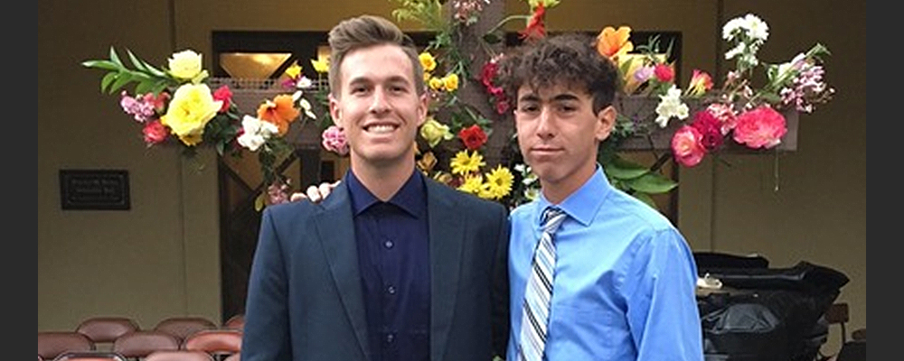 Trent Hisey, Left, poses with fellow student. Courtey photo. 