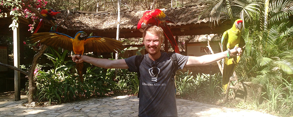 Haven King-Nobles posing with exotic birds.