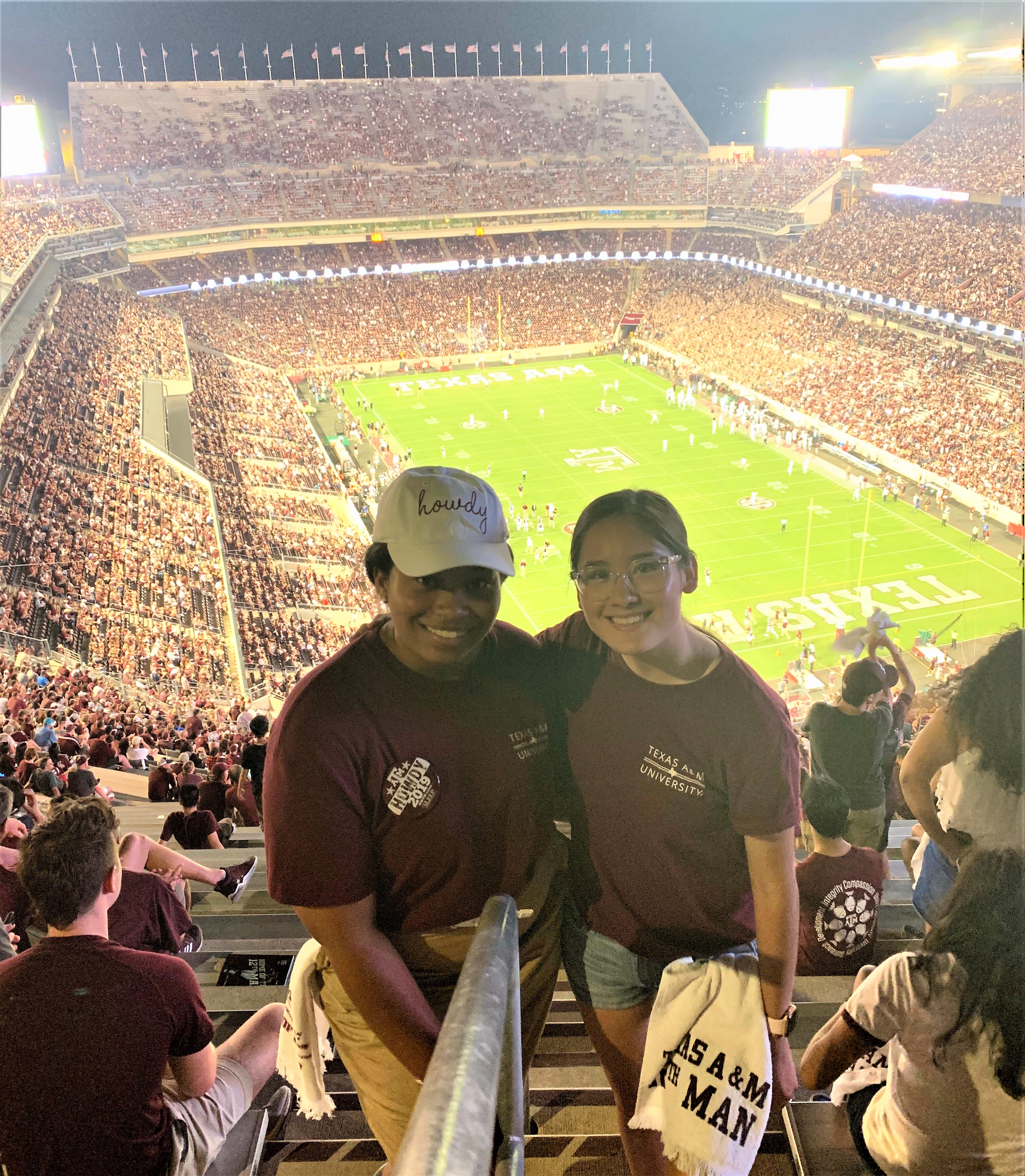 Angie (right) attends a football game at Texas A&M University at College Station, where she is a sophomore. Photo courtesy of Gay Ingram.