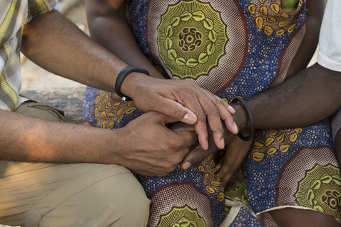 The Rev. Gary Henderson (left) prays with Adama Johnbull (center) and her husband Christopher Johnbull outside their home in Baima Songa near Bo, Sierra Leone. Adama Johnbull was nine months pregnant and was suffering from several medical complications, including malaria. Several villages in the Bo district will receive new, insecticide-treated mosquito nets from the United Methodist Church's Imagine No Malaria campaign in the first planned redistribution to replace nets given in 2010. Henderson heads the denomination's Global Health Initiative. Photo by Mike DuBose, UMNS. A special prayer vigil will be held on Saturday, September 5, 2020, in memory of Bishop John Yambasu. File photo by Mike DuBose, UMNS.