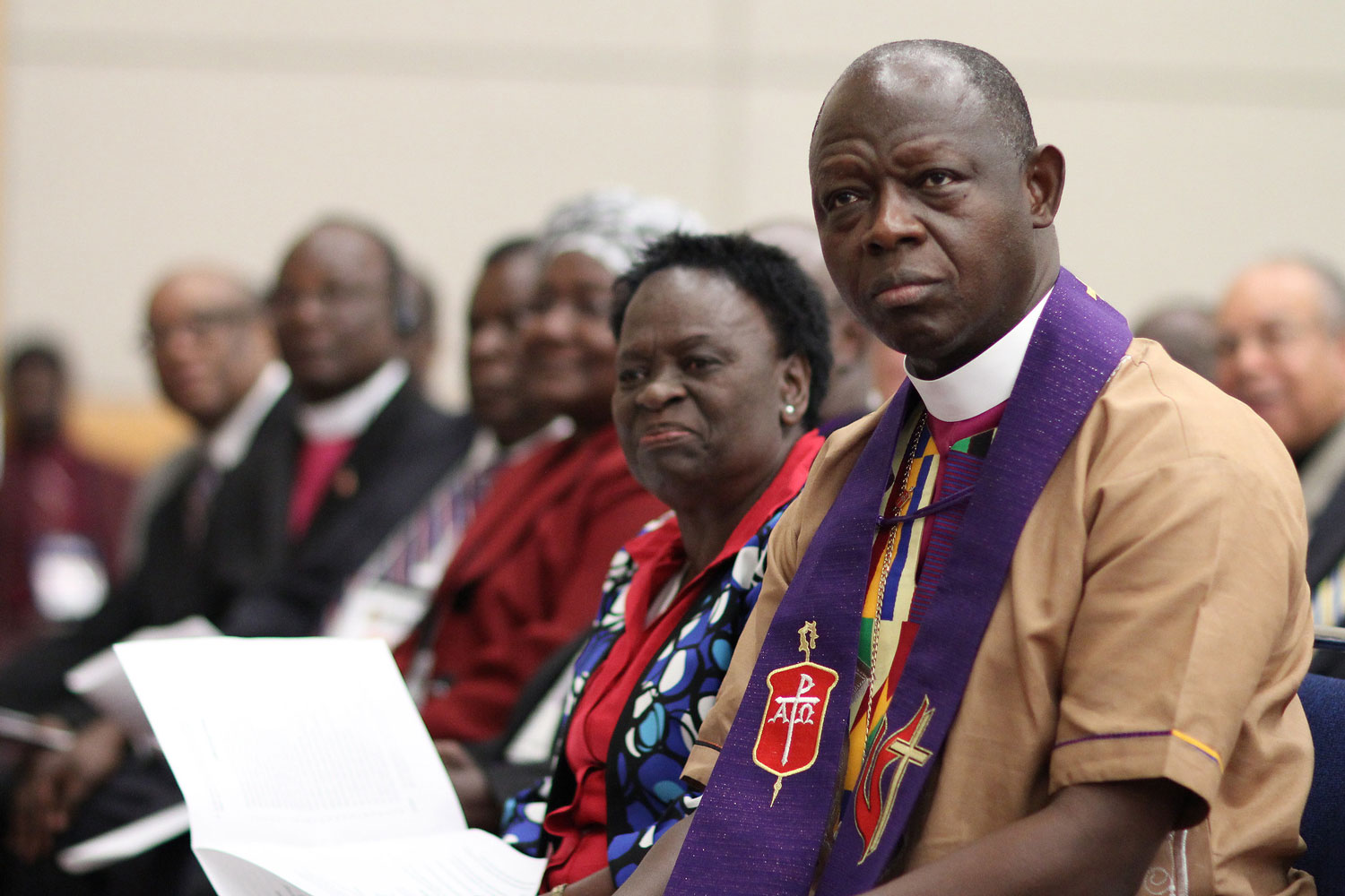 Bishop John K. Yambasu prays during the African central conferences worship service on Sunday, May 15 at the Oregon Convention Center. Photo by Kathleen Barry, UMNS.
