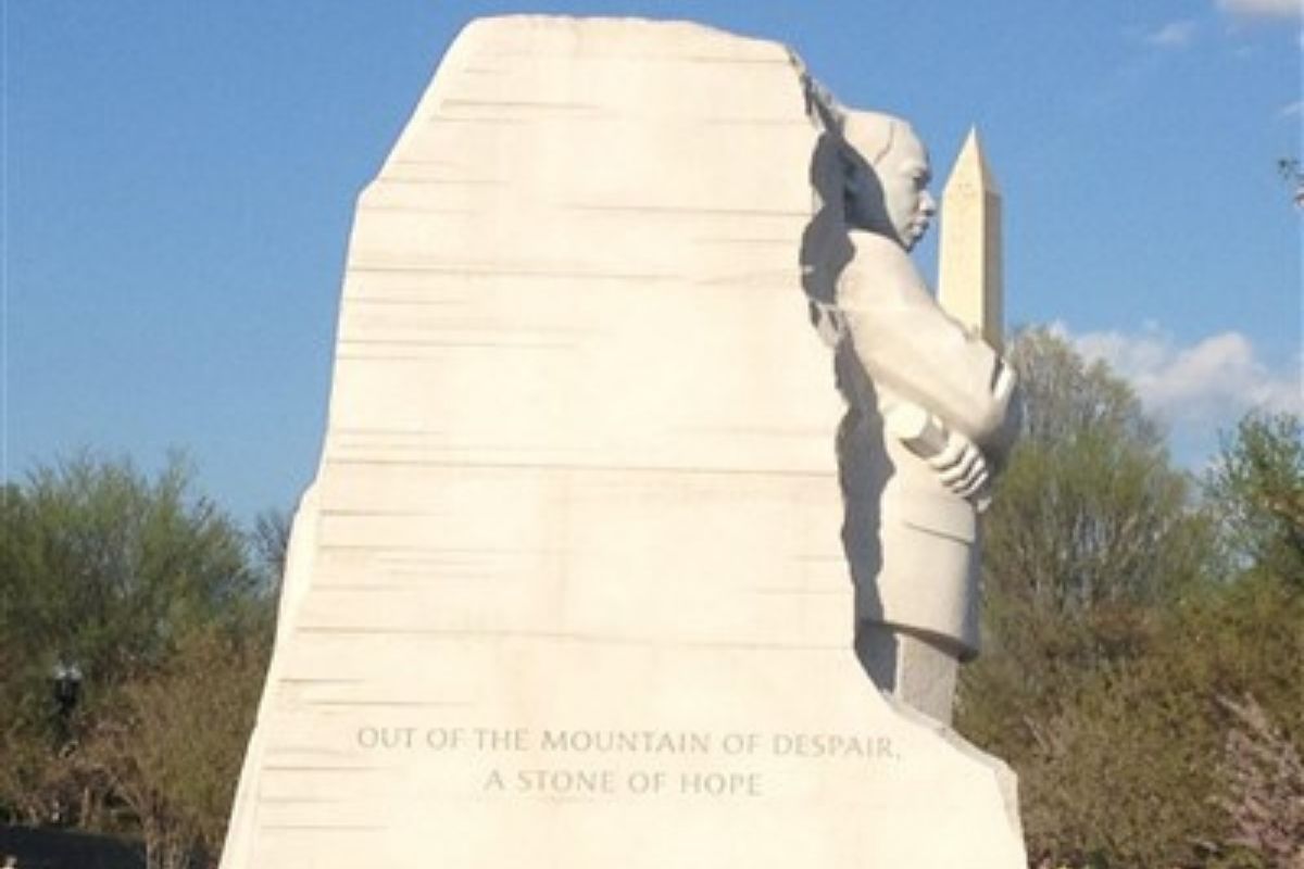 Martin Luther King Jr.'s Monument appears to cradle the Washington Monument in Washington, D.C. (Image by Maidstone Mulenga/Council of Bishops.)