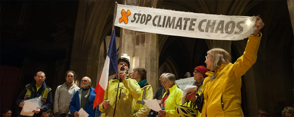 November 2015: In the Saint Merry church in Paris, climate pilgrims from across the world, many of them representing WCC member churches, met just before the COP21 UN climate talks.  Photo: Sean Hawkey/WCC, 2015.