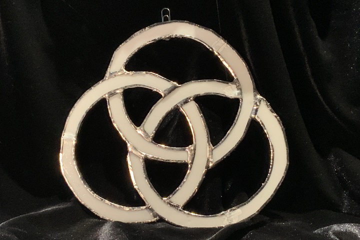 Christian symbol for the Holy Trinity in stained glass by Mary Helen Marigza