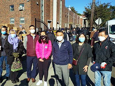 Volunteers and visitors at First UMC, Flushing, Queens.&nbsp;Left to right: Rev. Tom Vencuss and his wife Wendy, New York Conference; First UMC’s associate pastor, Rev. Chanyoung Choi; a visiting representative from a Korean-American civil society organization; Mr. Ha Yonghwa, chairperson of FUMC’s mission committee; Congresswoman Grace Maeng; Rev. Chongho James Kim, senior pastor.&nbsp;Photo: Mina Yoo