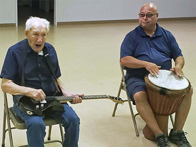 Al Weber plays the guitar.