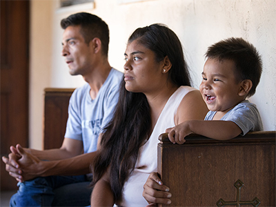 Jose Antonio Marchas Novela recounts the threats of violence that caused him to flee Mexico with his wife, Irlanda Lizbeth Jimenez Rodriguez, and their 1-year-old son, Jose Antonio in 2018. The family took shelter at the Christ United Methodist Ministry Center in San Diego while seeking asylum. The United Methodist Board of Global Ministries has allocated $1.1 million to aid asylum seekers in the U.S. File photo by Mike DuBose, UM News