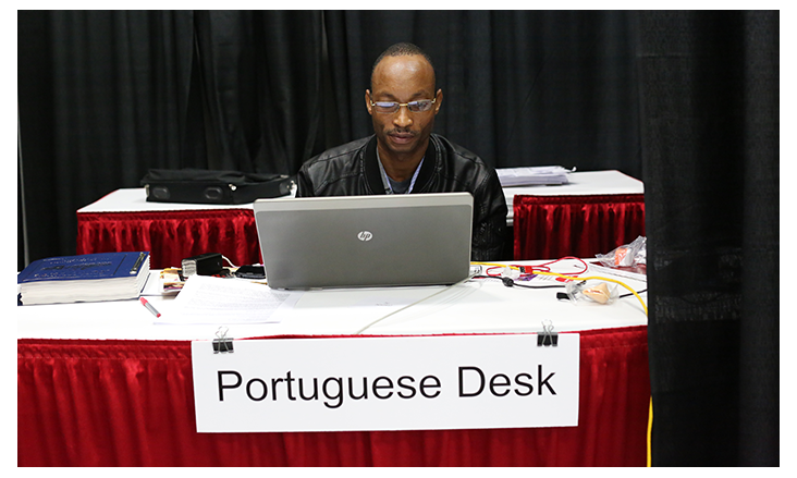 Nafral Oliveria Massela Nafral, conference communicator for Mozambique, works on the Portuguese desk during the 2016 United Methodist General Conference in Portland, Ore. Photo by Kathleen Barry, United Methodist Communications Kathleen Barry