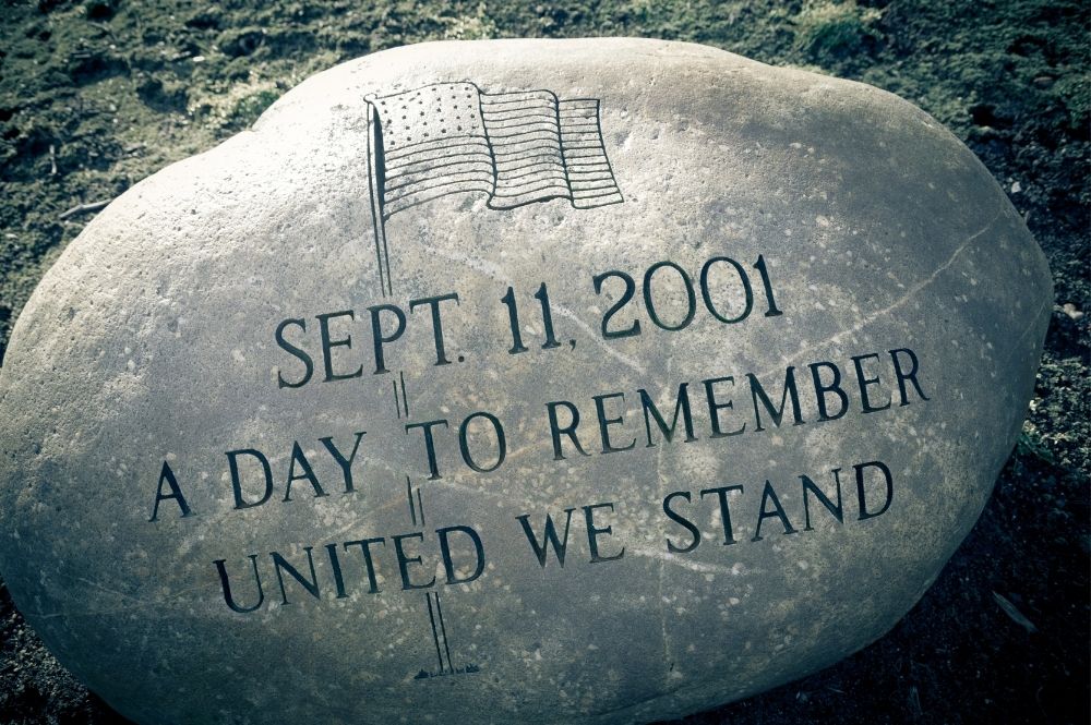 Prayers for the 20th anniversary of 9/11. Image by Canva.