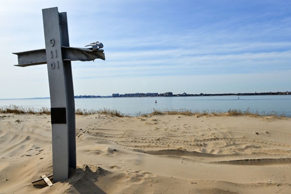 A 9/11 memorial in Breezy Point, Queens, New York, contains etchings representing the community members who died from the events of September 11, 2001. Photo by Canva.
