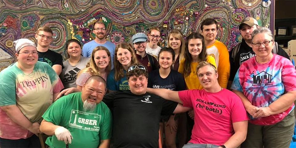 Deb Johnson (right) went on a mission trip in March of 2020 with students from the Ferris State University and Central Michigan University Wesley Foundation Campus Ministry groups. They worked with various groups in Louisiana engaged in restoration after natural disasters and building for the future. ~ Facebook/Big Rapids Wesley House